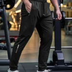 Men'S Casual Sports Nine-Point Pants with Breathable Elastic Fabric, Drawstring Waist, And Zipper Pockets - Image 5